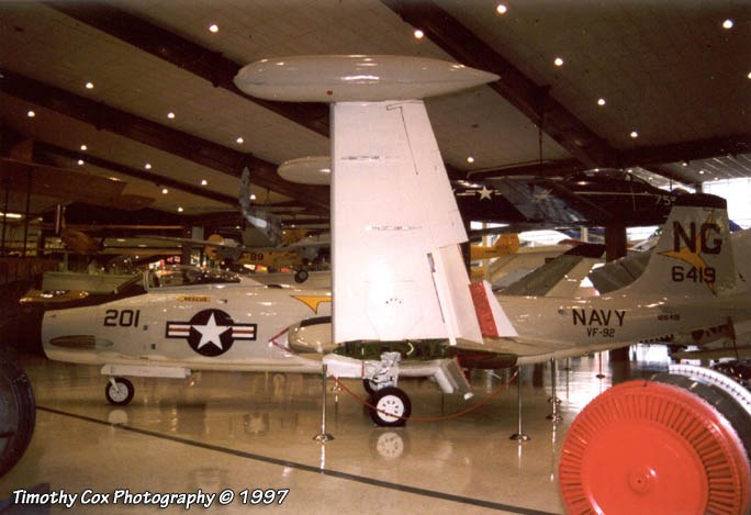 U.S. Navy F2H Banshee numbered 201 displayed inside a museum hangar.