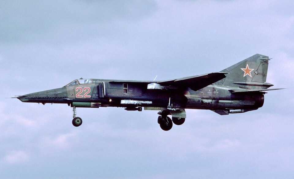 Mikoyan MiG-27 landing or taking off with landing gear extended, showing the variable-geometry strike aircraft developed from the MiG-23 family.