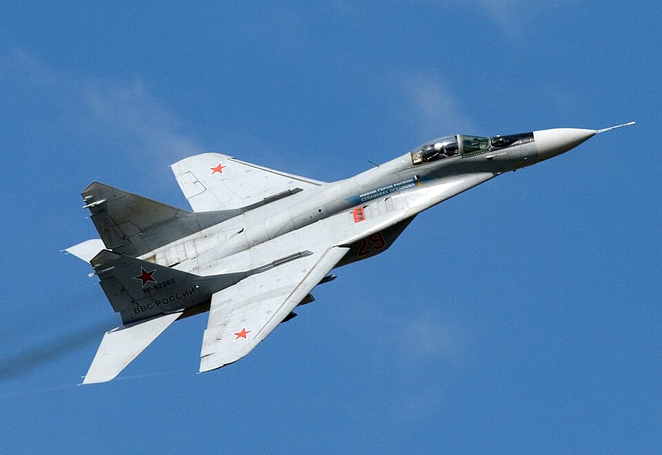 Mikoyan MiG-29 fighter in flight against a blue sky, showing one of Mikoyan's best-known fourth-generation fighter aircraft.