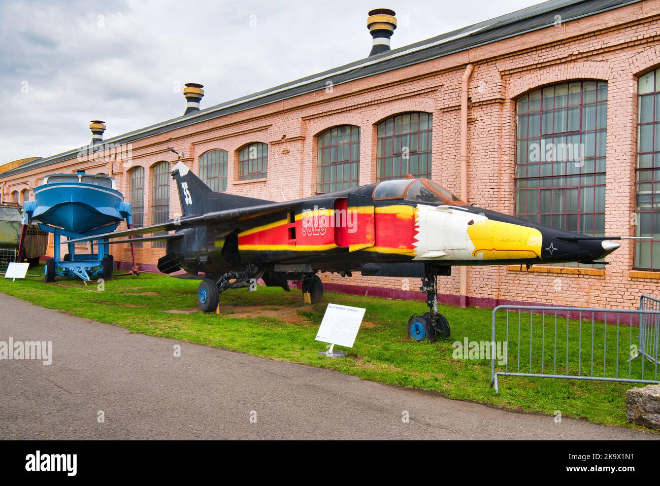 Mikoyan-Gurevich MiG-23 - SPEYER, GERMANY - OCTOBER 2022: red yellow black Mikoyan-Gurevich MiG