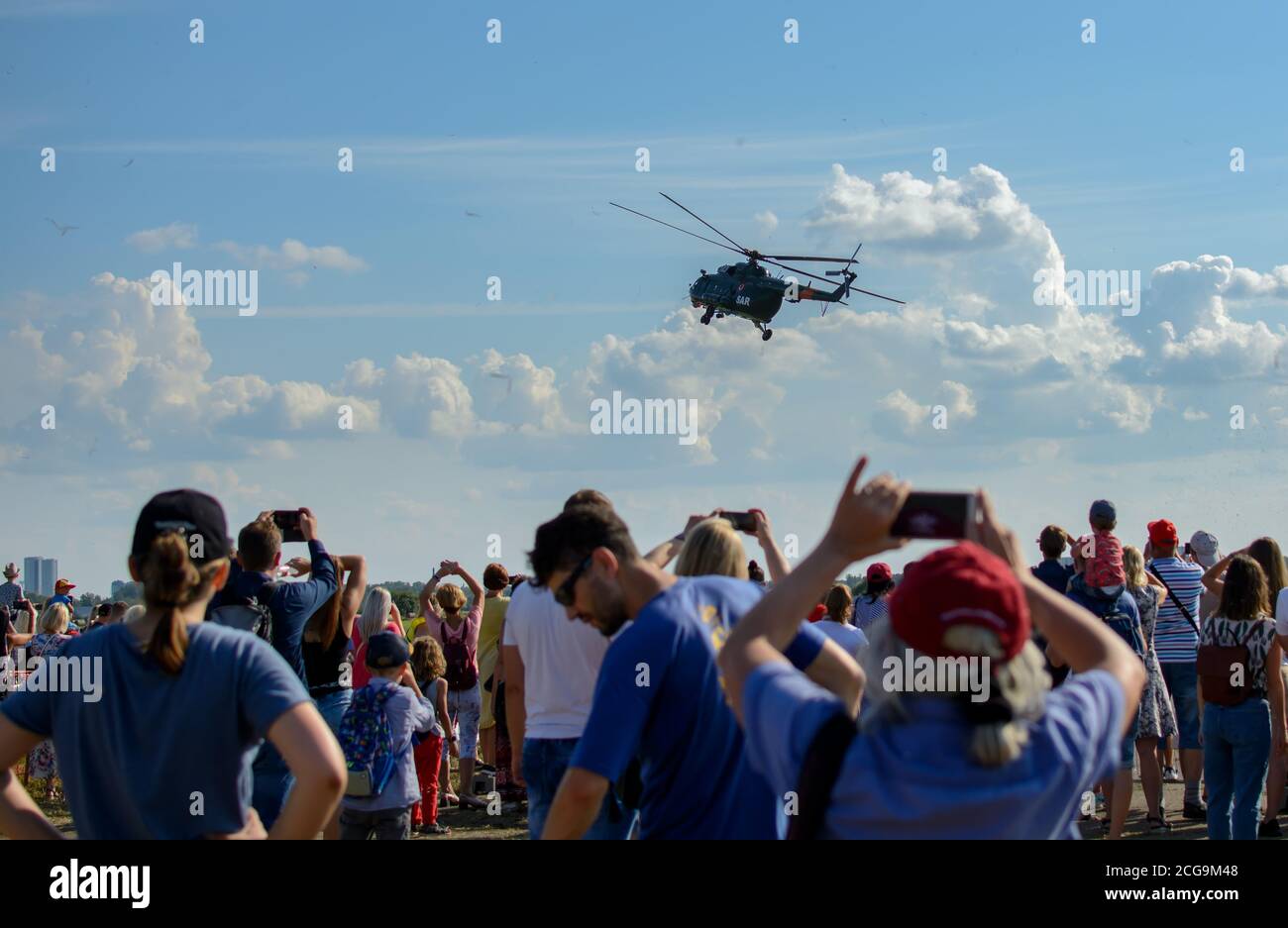 Mil Mi-17 - People are watching Mil Mi-17 helicopter taking off at Spilves Aviation