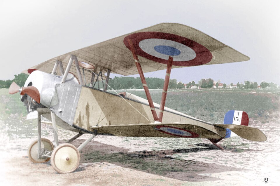 Nieuport 10 biplane in a colorized profile image, showing one of Nieuport's early military aircraft designs from the First World War era.