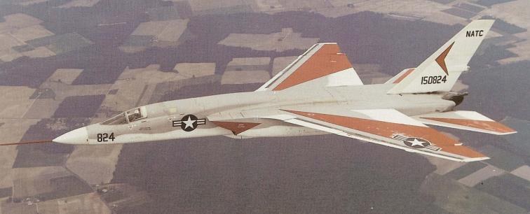 North American A-5 Vigilante 150824 flying over farmland with NATC tail markings.