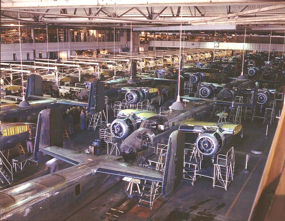 Interior view of North American Aviation's Inglewood plant, showing aircraft production work inside the California factory.