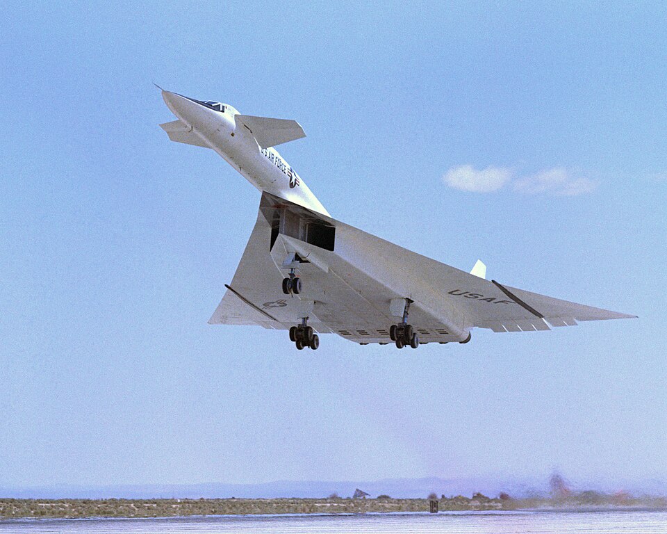 North American XB-70 Valkyrie above a runway, showing the experimental high-speed bomber developed by North American Aviation.