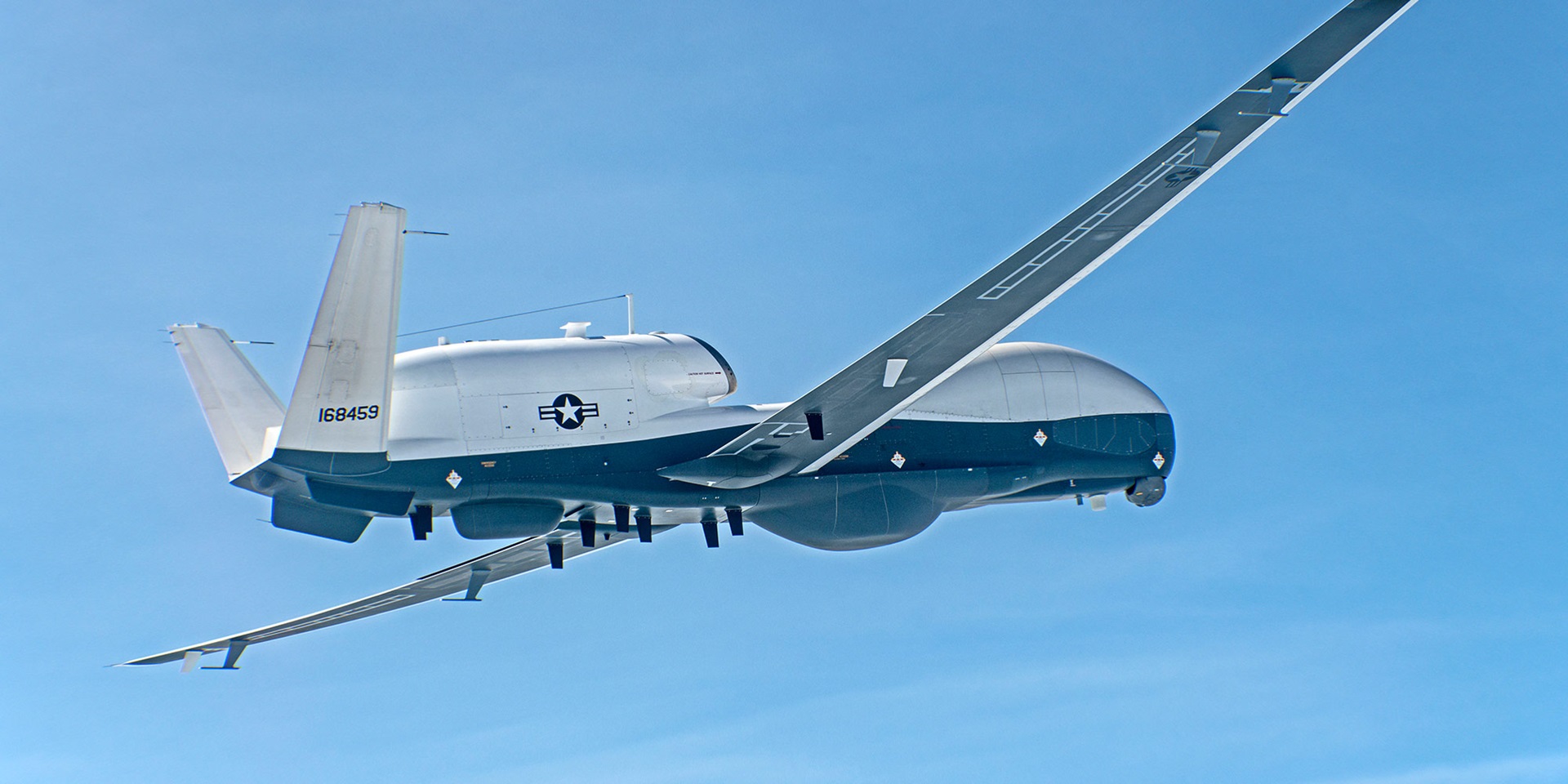 MQ-4C Triton unmanned aircraft flying with U.S. markings