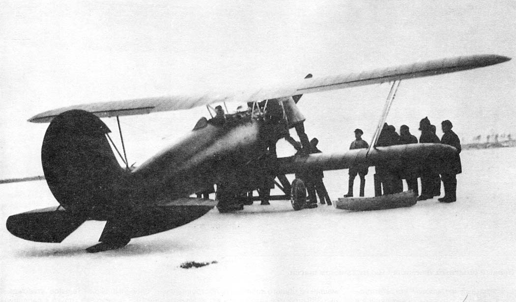 Polikarpov I-3 biplane fighter with ground crew