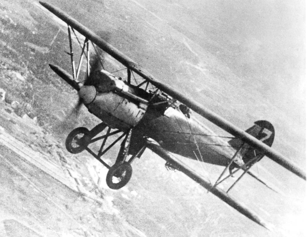 Polikarpov I-3 biplane fighter banking in flight