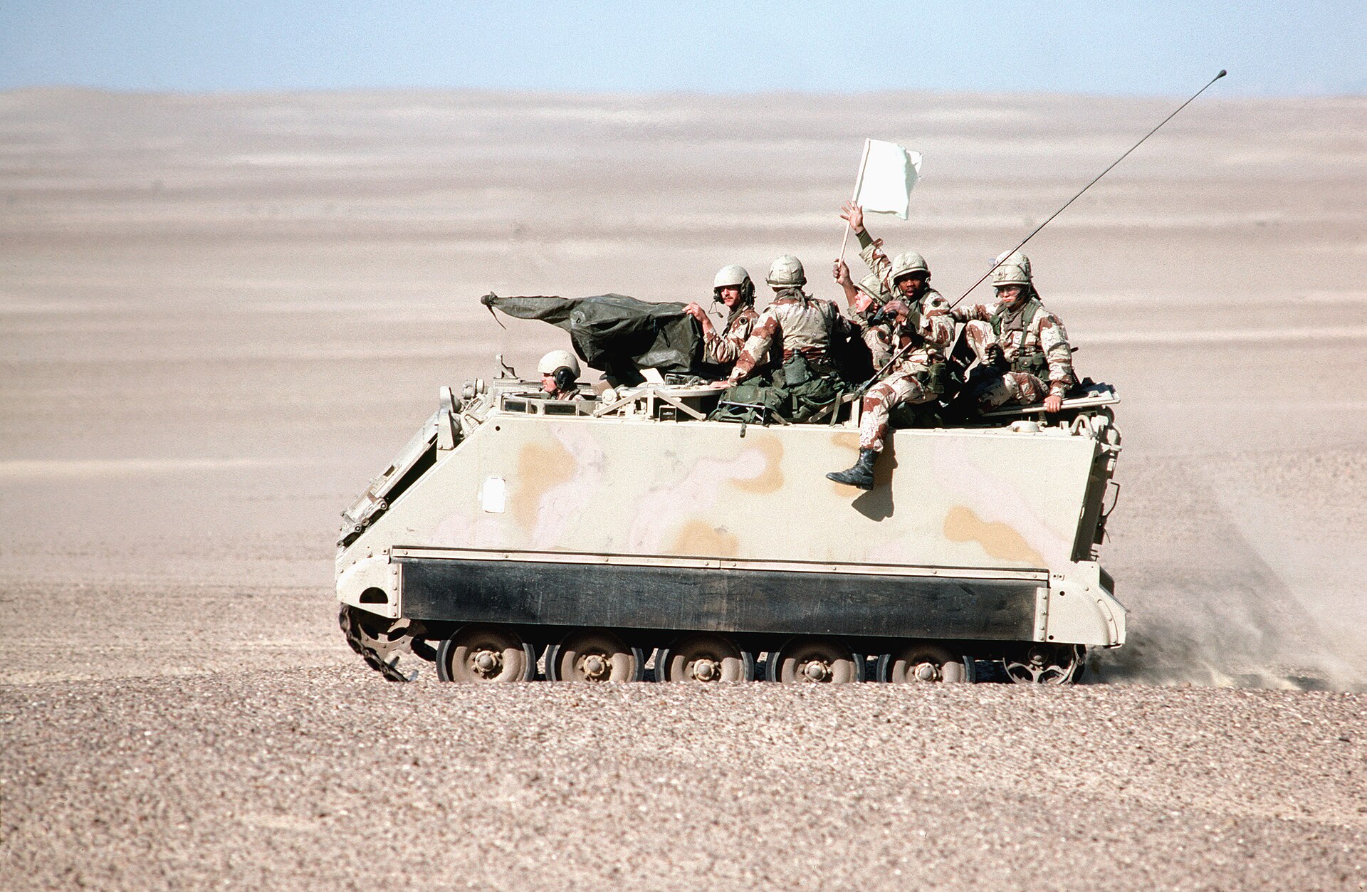 American troops, aboard an M113 armored personnel carrier, wave a "white flag" during their participation in Exercise BRIGHT STAR '82 DF-ST-.