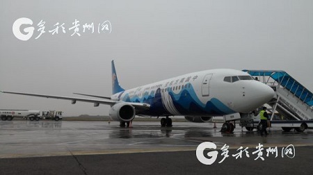 Airplane with Guizhou batik coating takes off in Guiyang.