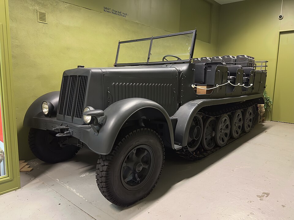 File:Arquebus Krigshistorisk Museum Norway. WW2 Allied Victory in Europe display. 8-ton Half-Track Sd.Kfz. 7 (KM m11) built by Krauss-Maffei, medium artillery tractor, prime mover of the German Army (halvbeltebil fra Wheatcroft 2004) (2023).jpg for the POLIS manufacturer profile.
