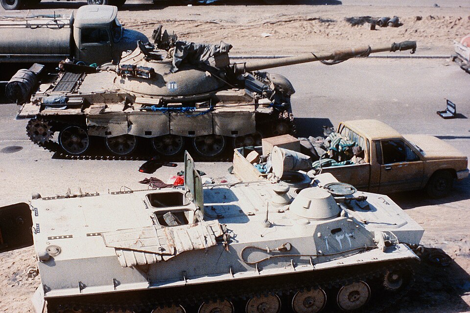 MT-LB, Mitsubishi pickup truck, T-62 tank and a Mercedes-Benz tank truck on the Highway of Death.