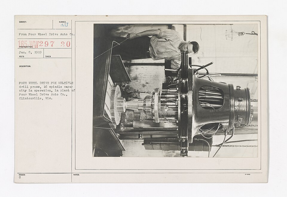 Motor Vehicles - Motor Trucks - Manufacturers - Four Wheel Drive Fox multiple drill press, 16 spindle capacity in operation, in plant of Fou.