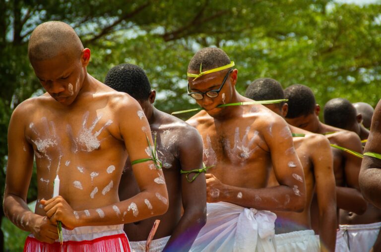 Male initiates preparing for ritual ceremony