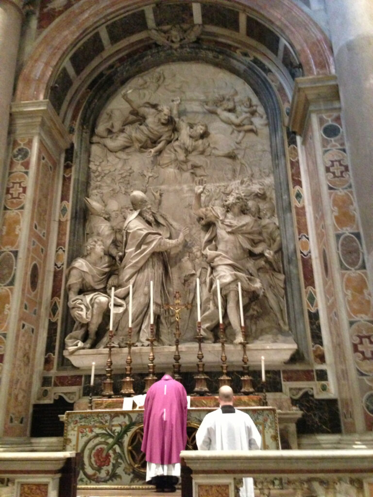 Priest celebrating Mass at Altar of Leo I in St. Peter's Basilica