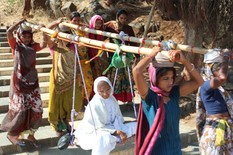 Jain nun being carried on the Palitana pilgrimage route