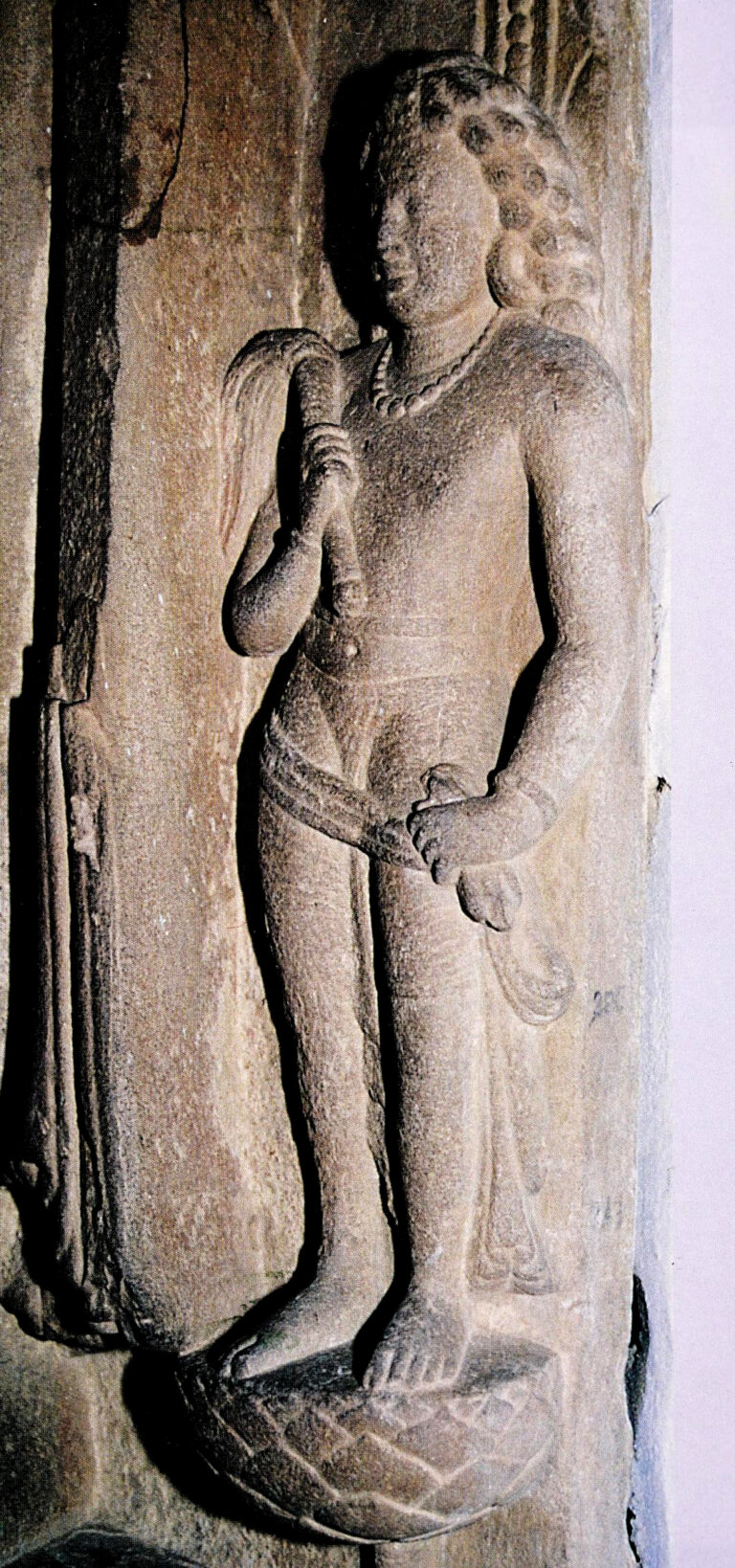 Buddhist devotee on a statue of Buddha standing inscribed Gift of Abhayamitra in 157 GE (477 CE) in reign of Buddhagupta