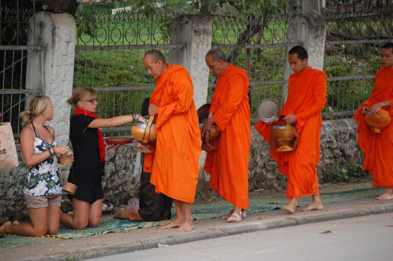 Monks collecting alms in Laos