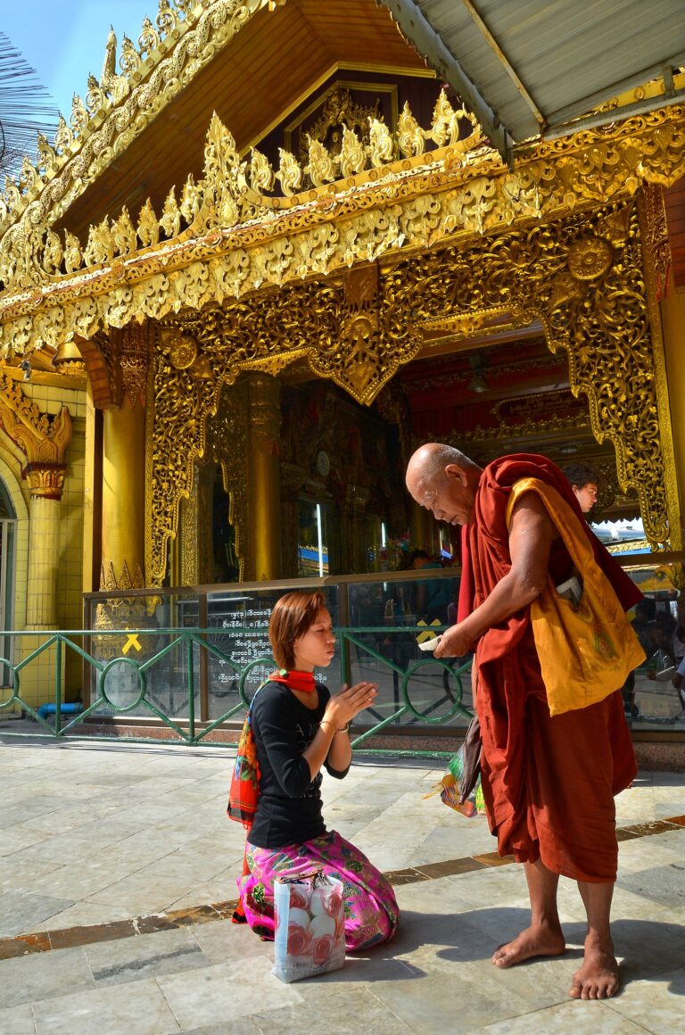 Alms giving to monks at Sule Pagoda