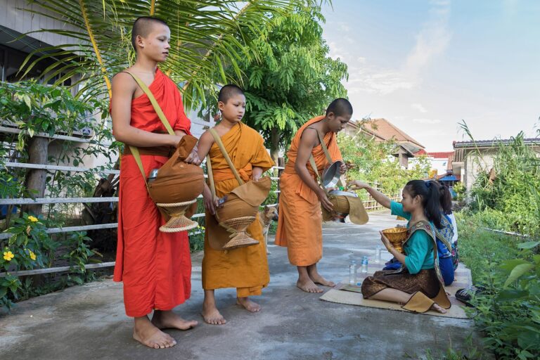 Buddhist alms practice in Si Phan Don