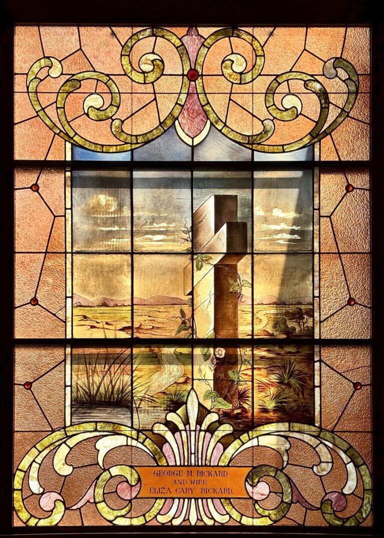 Stained-glass cross in a Presbyterian church