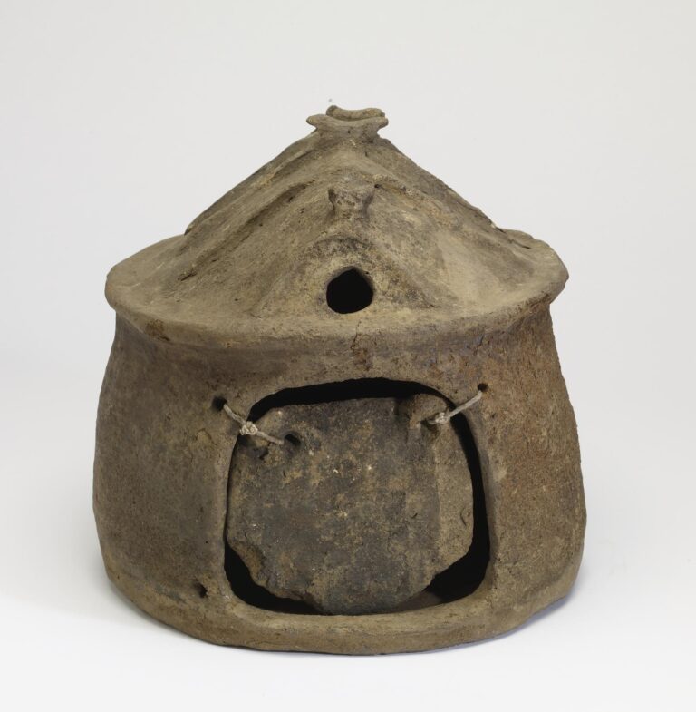 Urn in the Shape of a Hut and a Door