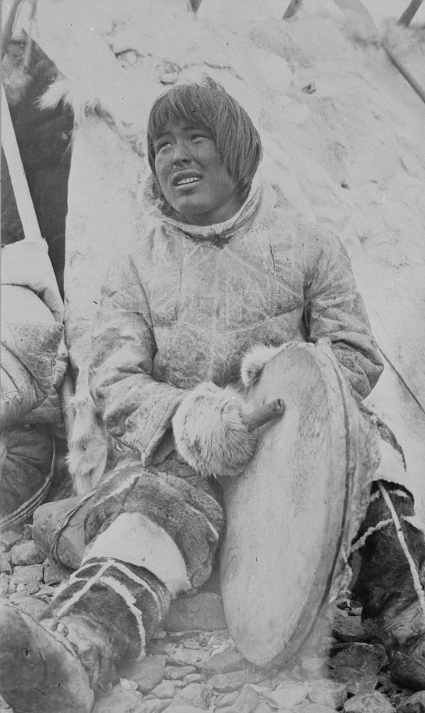 Aniurunna, Inuit man, singing and playing drum
