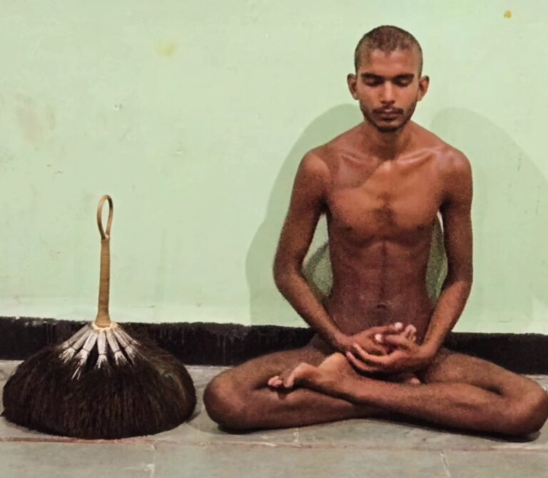 Digambar Jain Monk (Muni) in samayik meditation with pichhi placed beside him