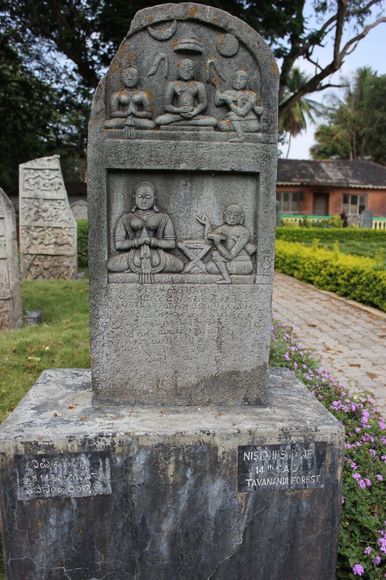 Nishidhi stone with 14 th century Old Kannada inscription from Tavanandi forest