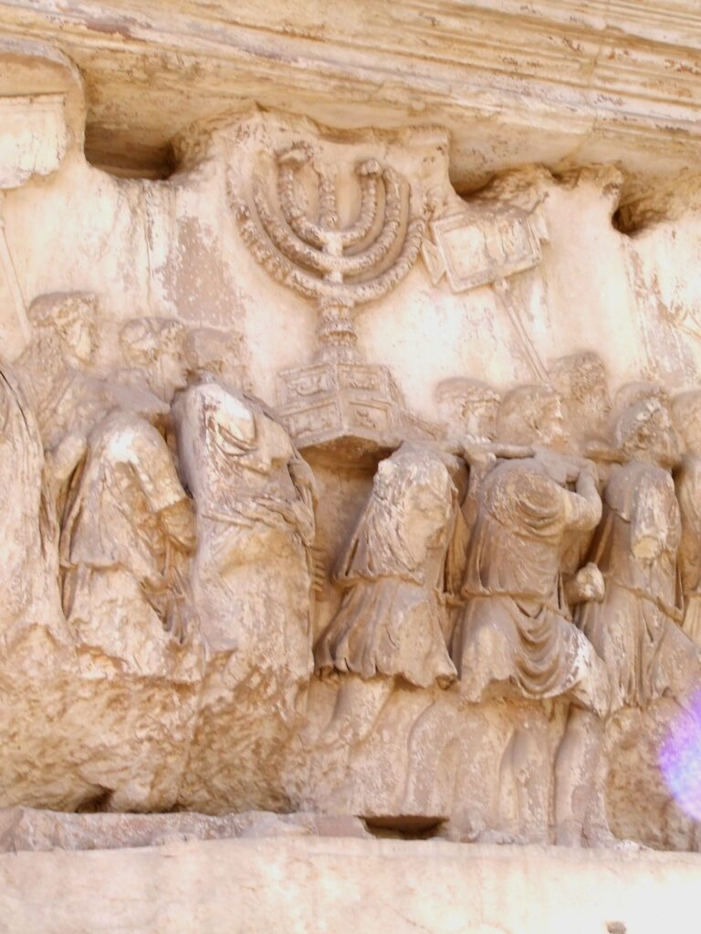 Carrying off the Menorah from the Temple in Jerusalem depicted on a frieze on the
