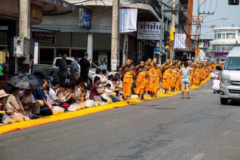 Monk procession receiving reverence from lay followers