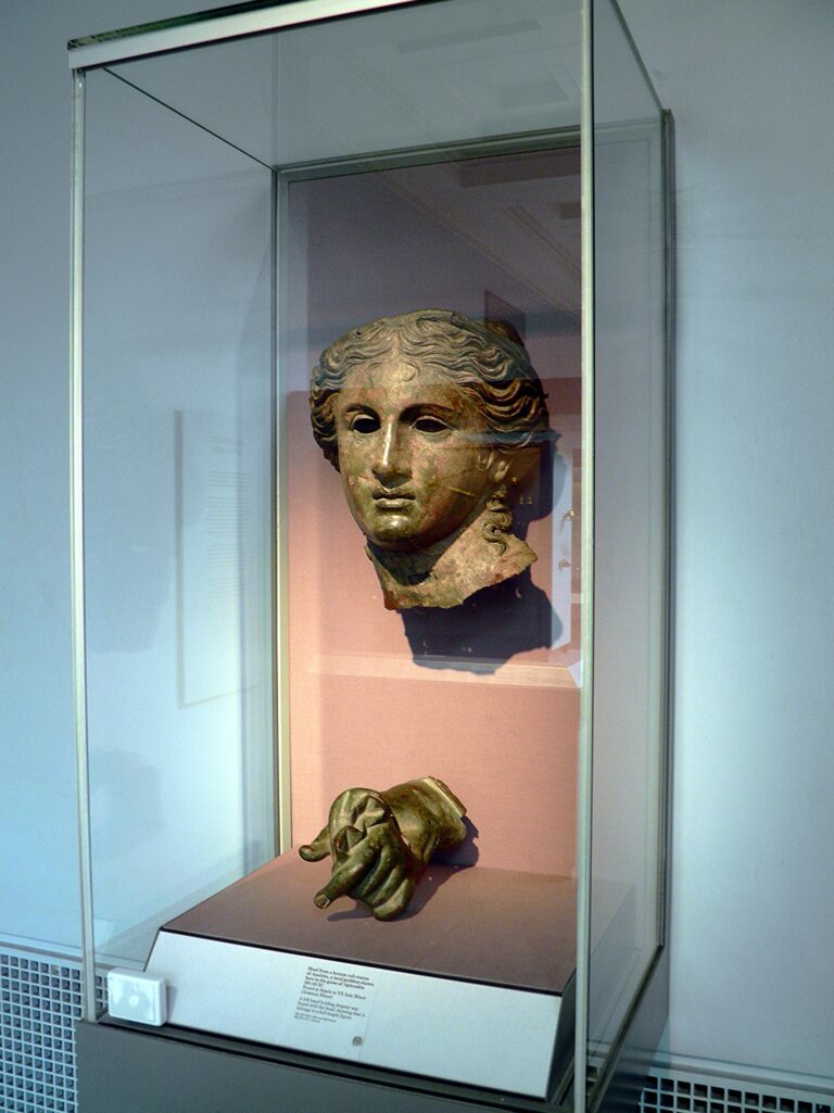 Head and left hand from a bronze cult statue of Anahita