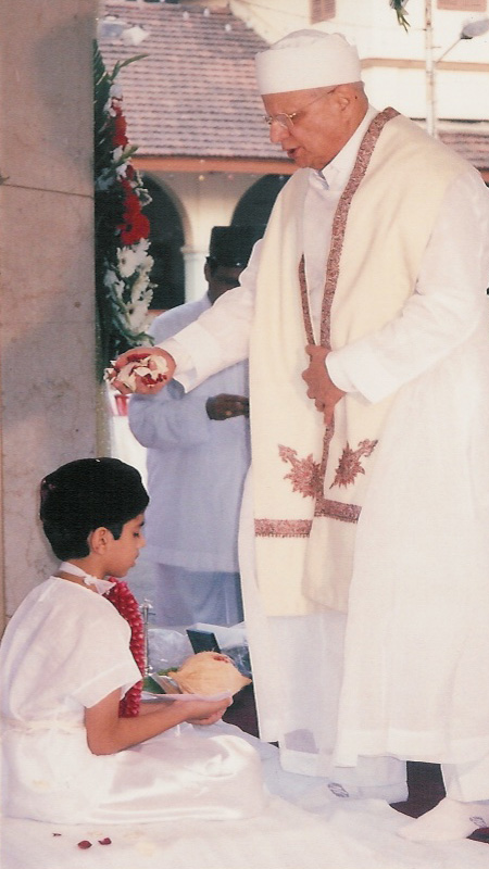 Seated Parsi navjote ritual scene
