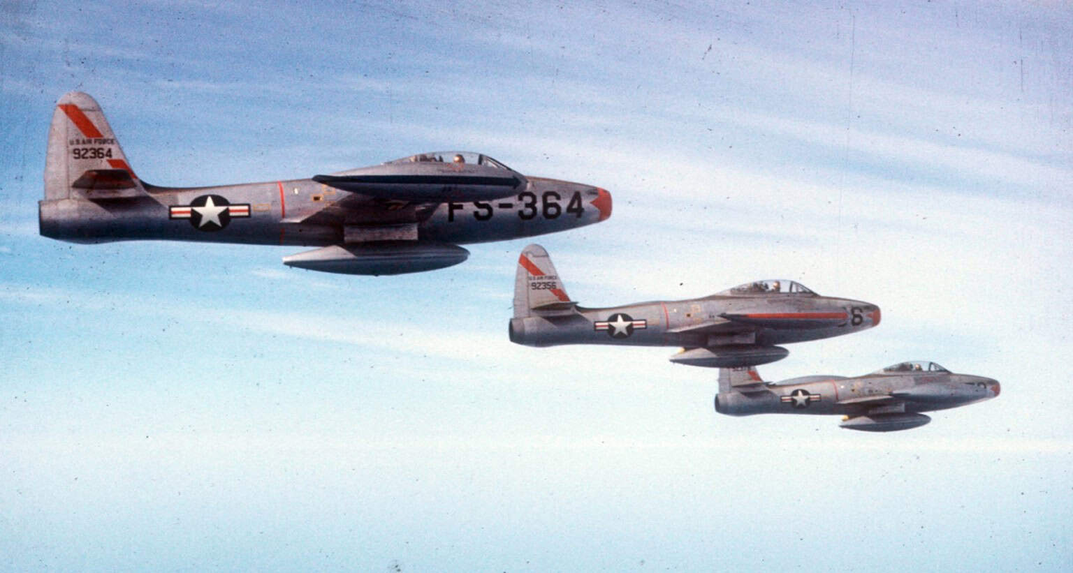Republic F-84 Thunderjet - U.S. Air Force Republic F-84E-15-RE Thunderjet fighters from the 27th Fighter Escort Group in flight over Korea. 1951 Republic F-84 Thund...