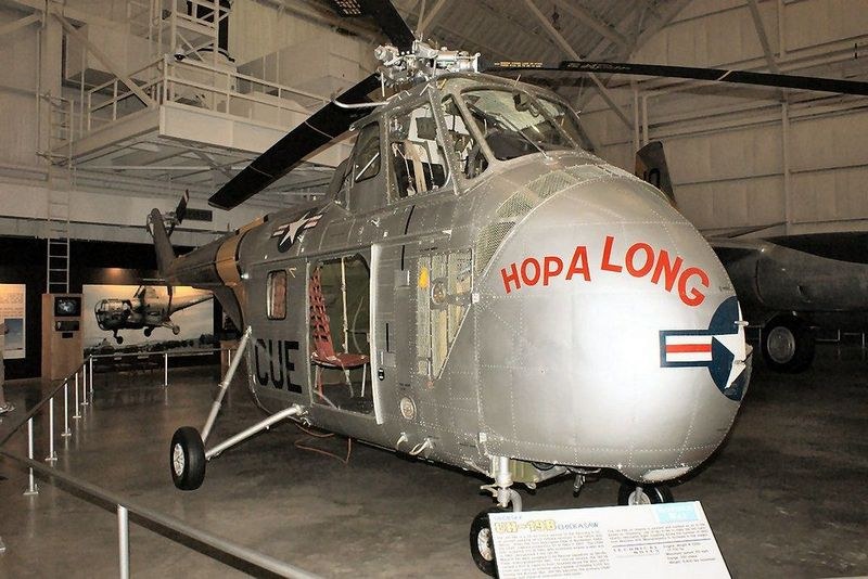 Sikorsky H-19 Chickasaw displayed indoors with Hopalong painted on the nose.