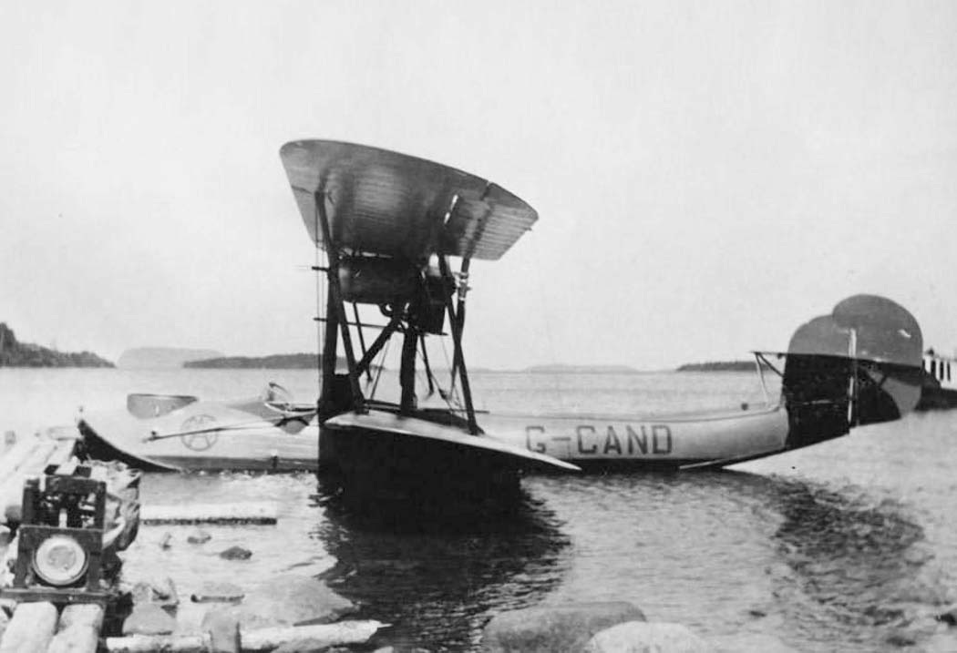 Vickers Vedette flying boat afloat with ground crew nearby